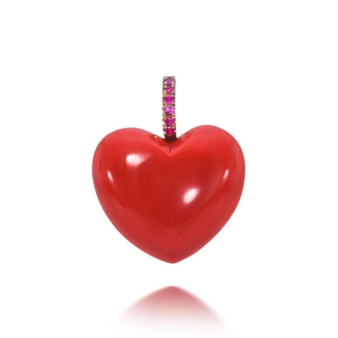 Rachel Quinn Jewelry 3-dimensional puffy heart charm that hangs from a magenta sapphire bail