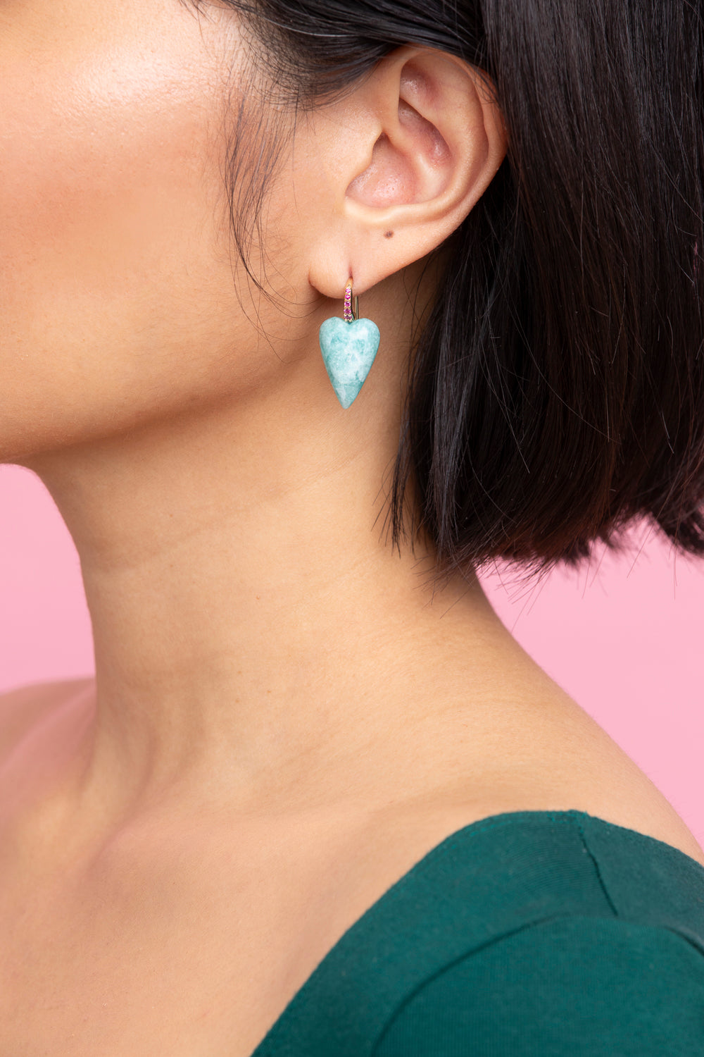 Rachel Quinn Jewelry amazonite 3-dimensional heart earring pair magenta sapphires on earring hoop on female model ear.