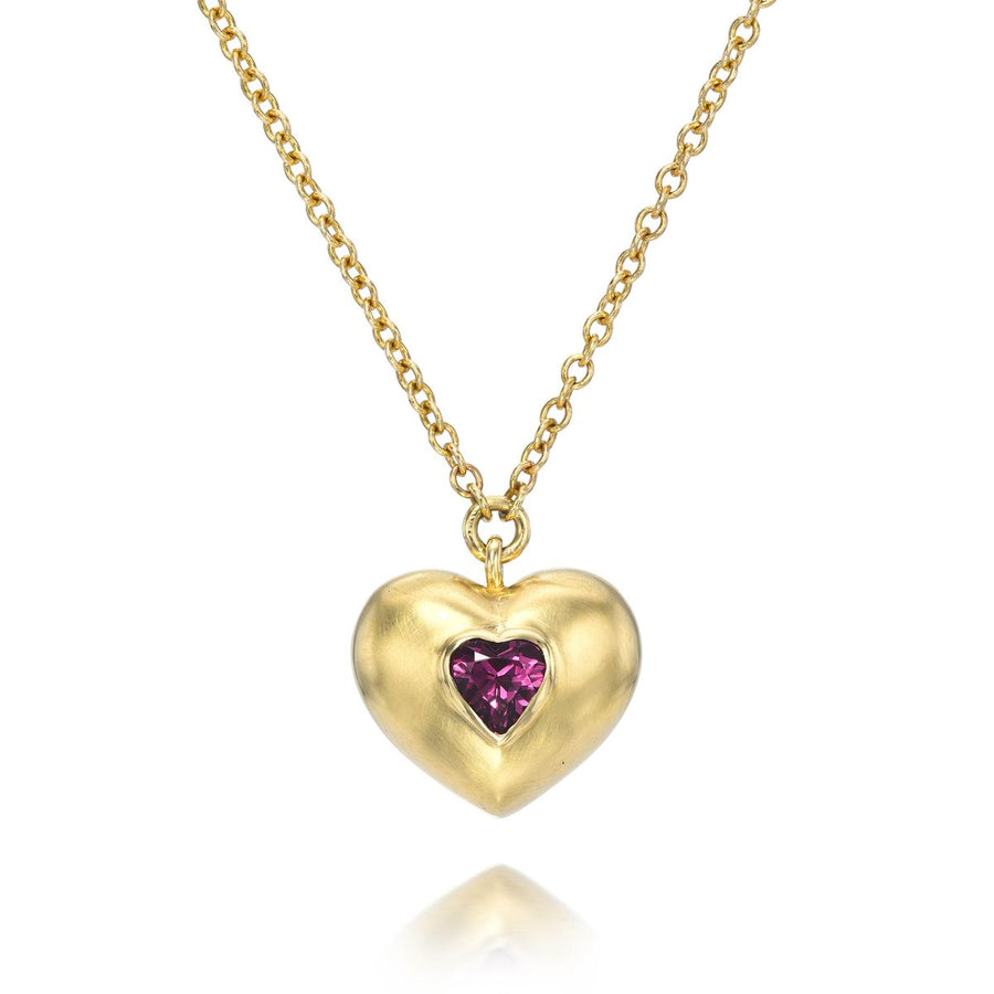 Rachel Quinn Jewelry 14k yellow gold heart shaped vessel necklace on gold chain with single heart ruby in center.