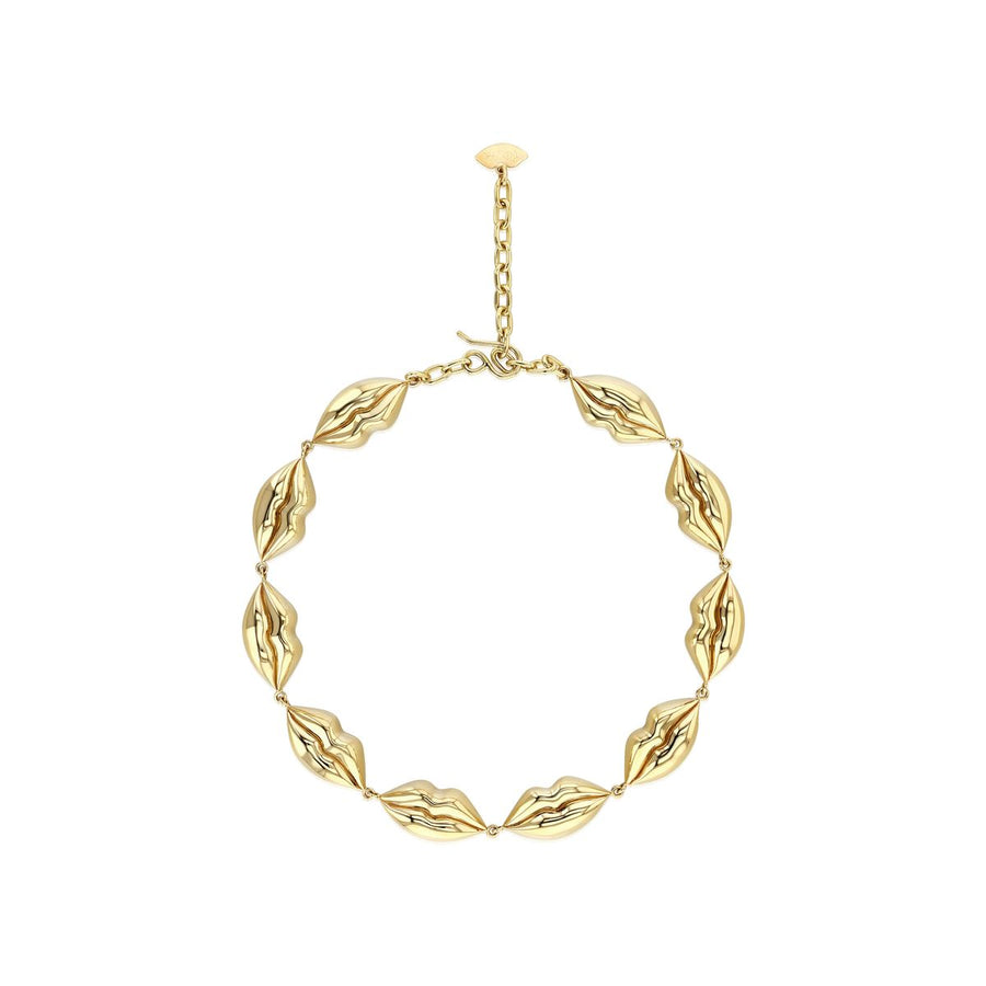 Ten gold lips with hook and chain clasp on white background