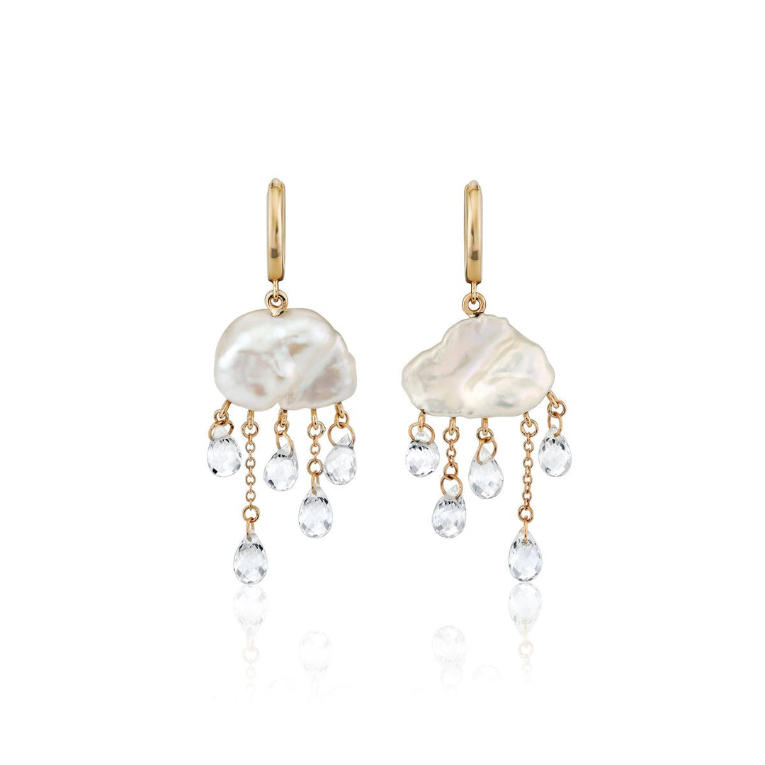 white cloud-shaped pearls on yellow gold hoops with white topaz briolettes dangling below like rain drops