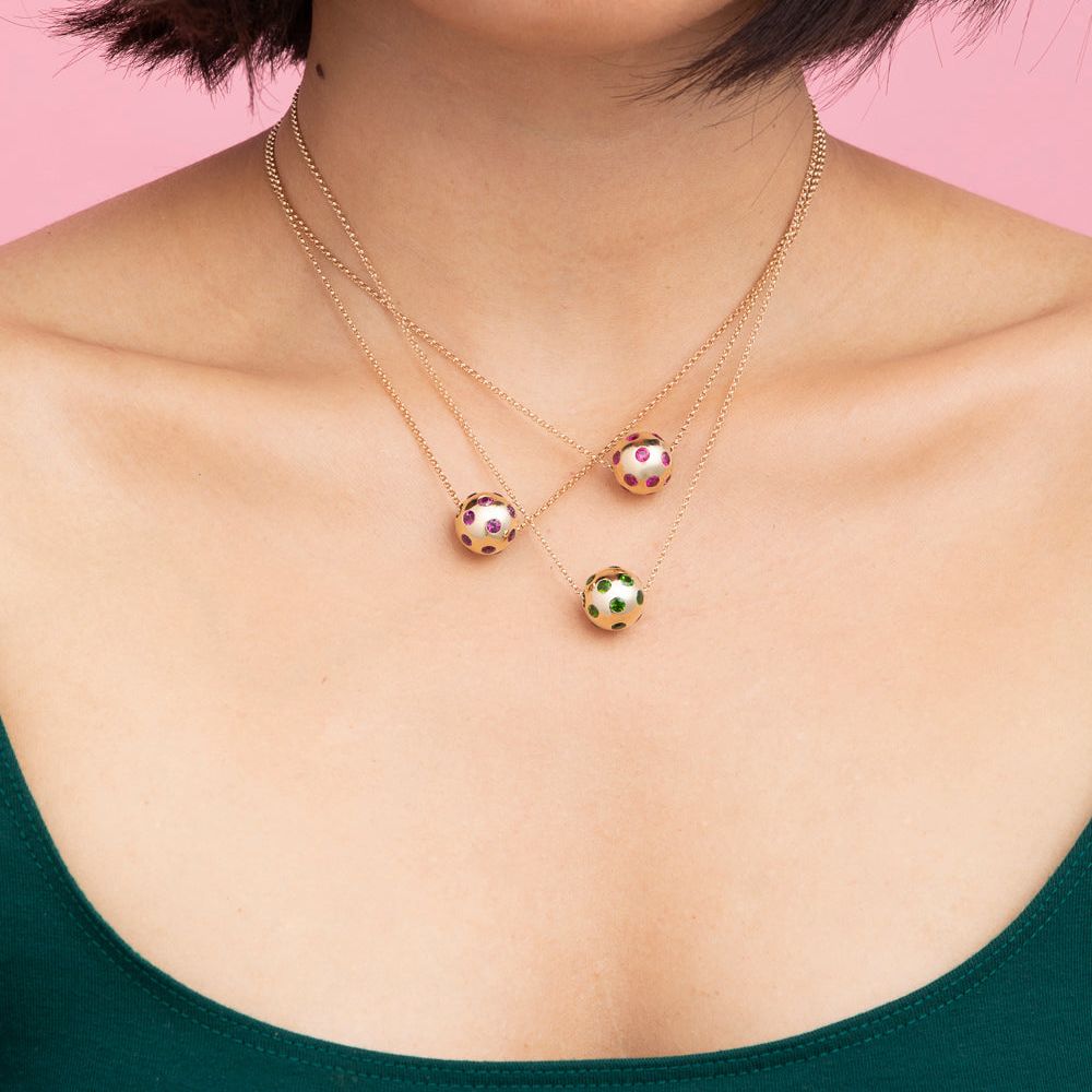 Rachel Quinn Jewelry Polka Dot Sphere Necklaces multiple color options shown stacked on female model neck.