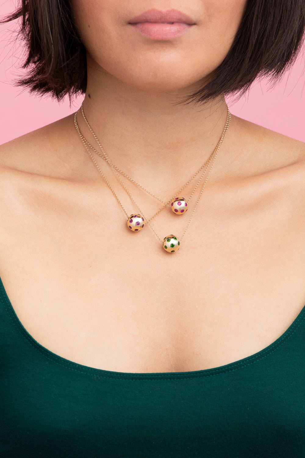 Rachel Quinn Jewelry Polka Dot Sphere Necklaces multiple color options shown stacked on female model neck.
