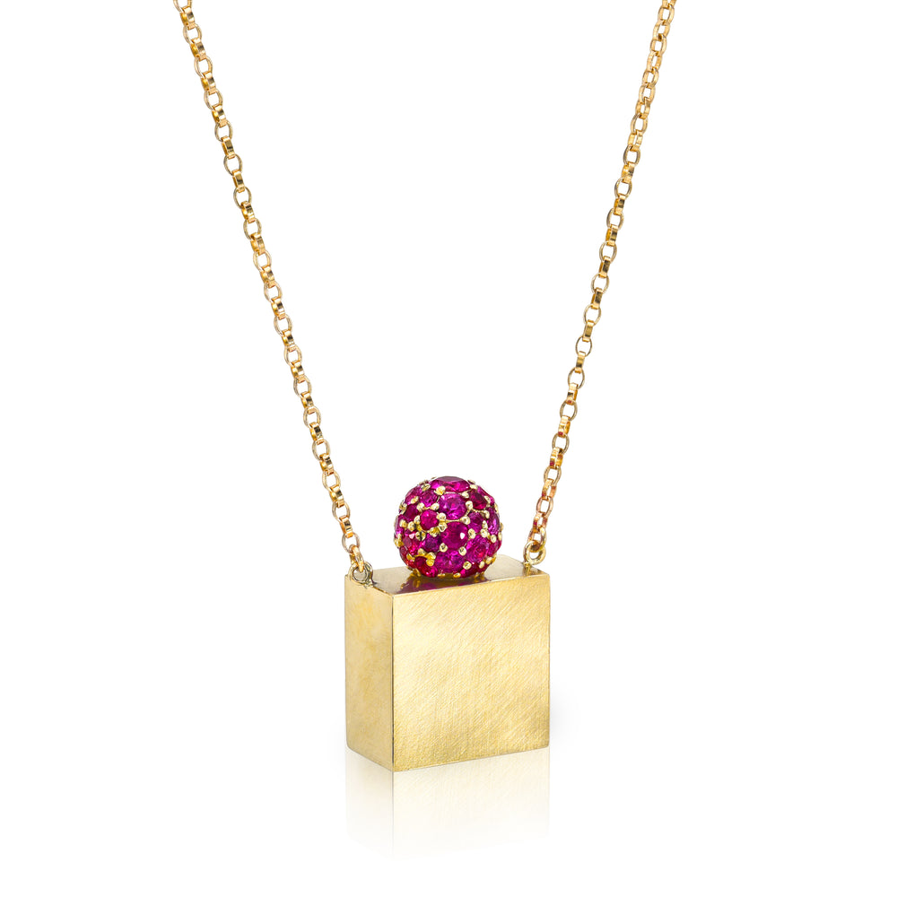 Rachel Quinn Jewelry 14k yellow gold square vessel box necklace gold chain with pink sapphire pave gold screw ball top side view.