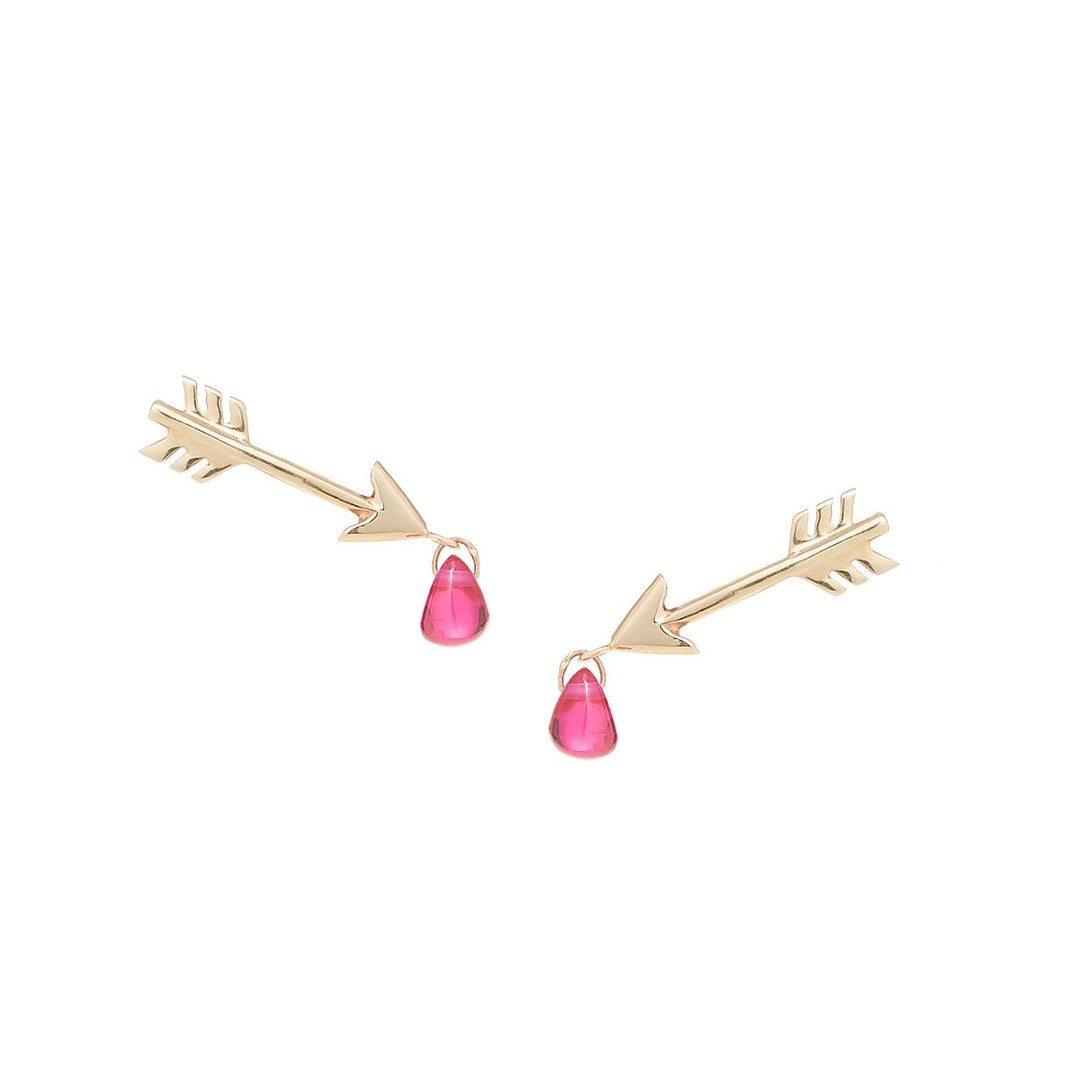 Yellow gold arrow studs with pink ruby droplets dangling from the arrows's tips
