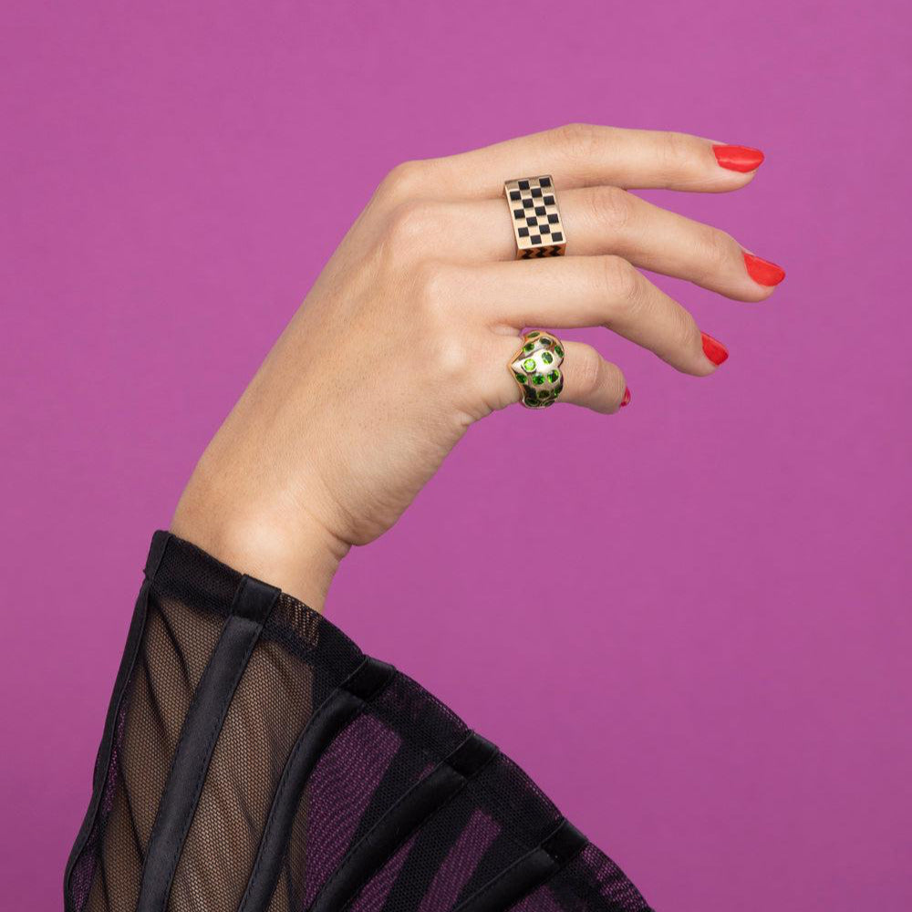 rachel quinn jewelry block ring in yellow gold and black shown on model hand