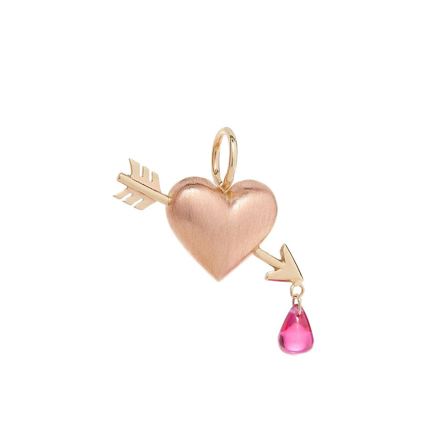 Small puffy rose gold heart charm with a matte finish pierced diagonally with a yellow gold arrow with a pink ruby droplet dripping from its tip