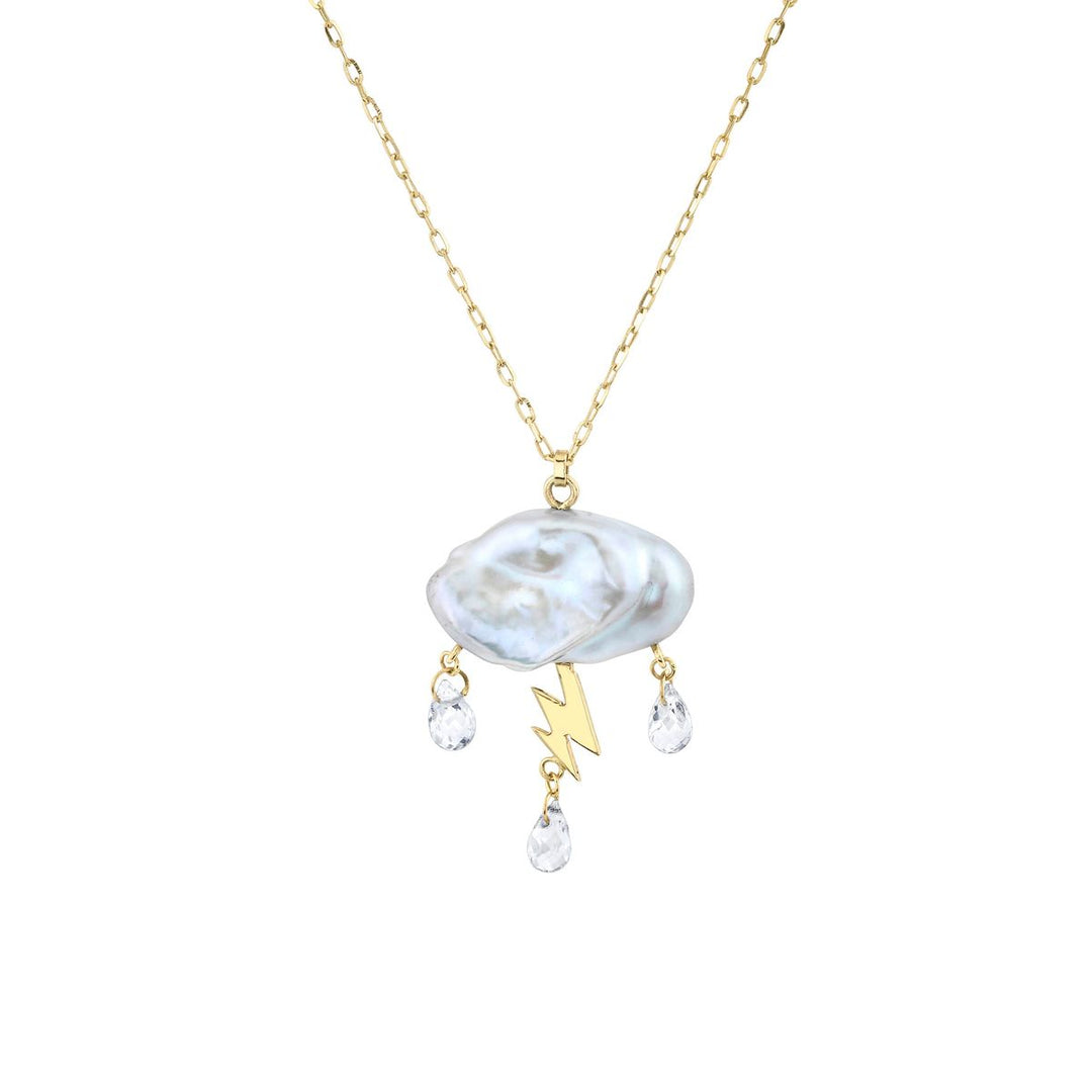 White keshi pearl cloud electrified with a 14K yellow gold lightning bolt as a trio of white topaz rain down on gold chain necklace