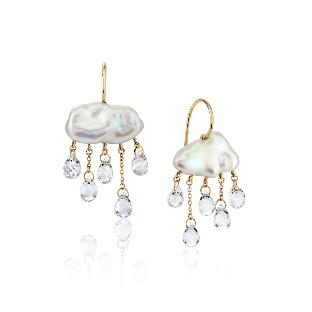 White cloud-shaped pearl earrings on yellow gold ear wire with 5 white topaz rain drops cascading below each
