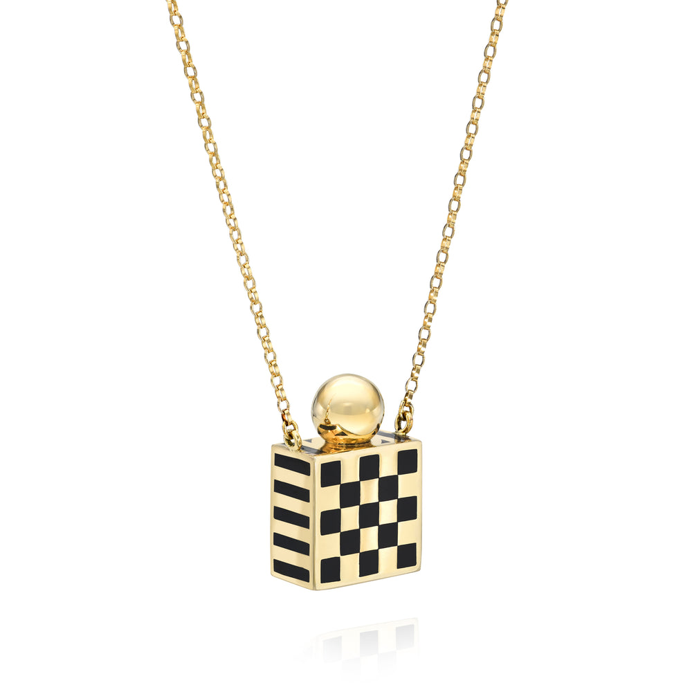 Rachel Quinn Jewelry 14k yellow gold black checkered square vessel box necklace gold chain with gold screw ball top side view.