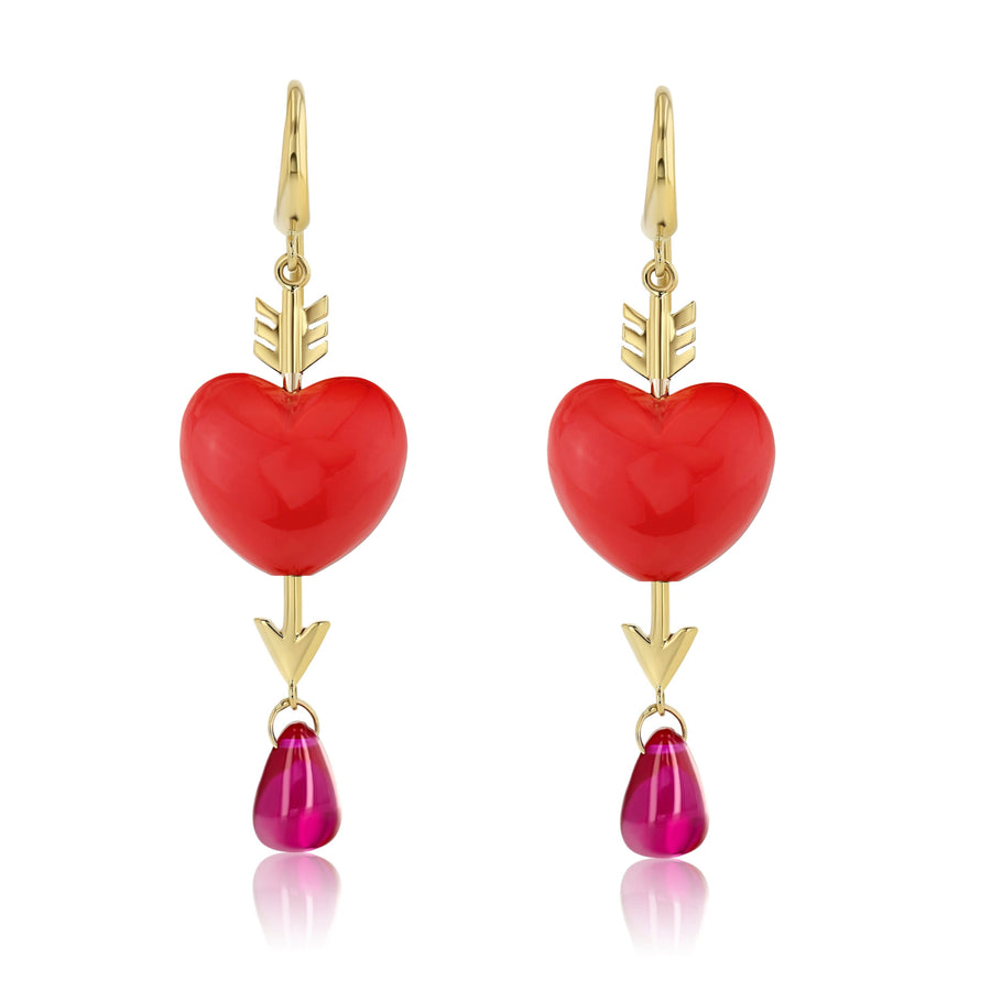 Heart-shaped earrings with gold arrows and pink teardrop stones on a white background