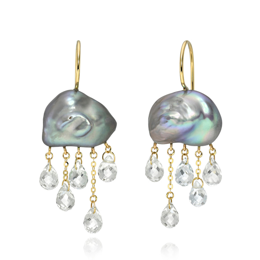 Pair of grey baroque pearl earrings with gold hooks and crystal droplets on a white background