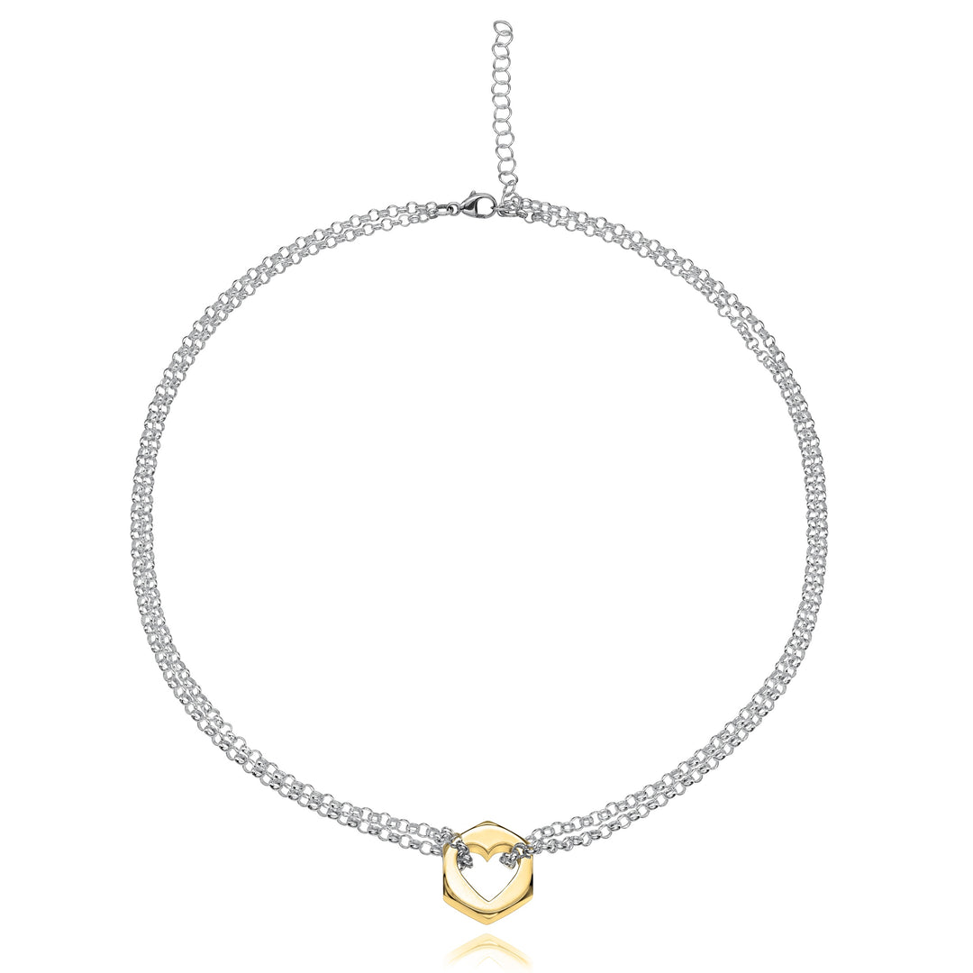 Yellow gold hex nut pendant necklace with a heart-shaped cut out in center with silver chain looped through either side, on a white background