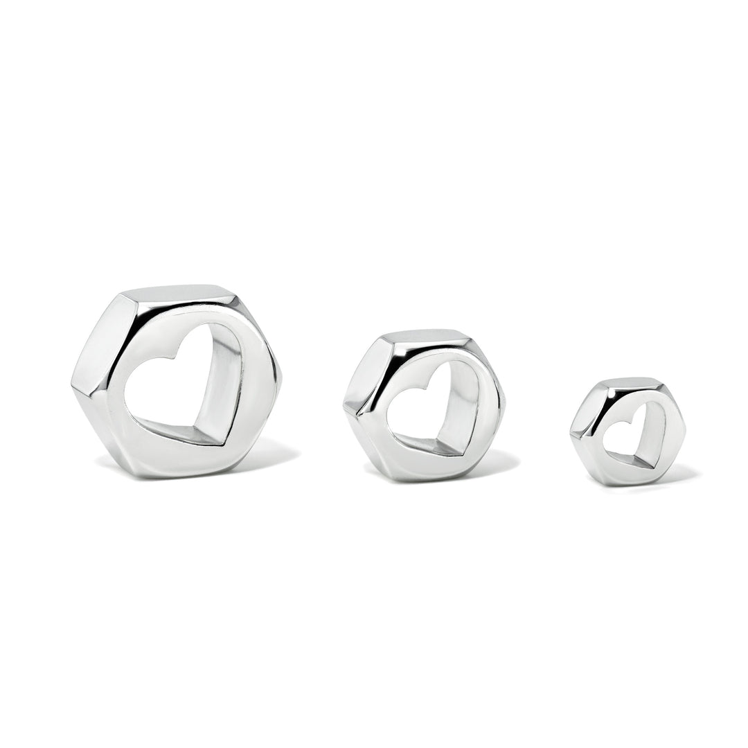 Set of three silver hex nut charms in sizes large, medium, and small with heart-shaped center holes on a white background