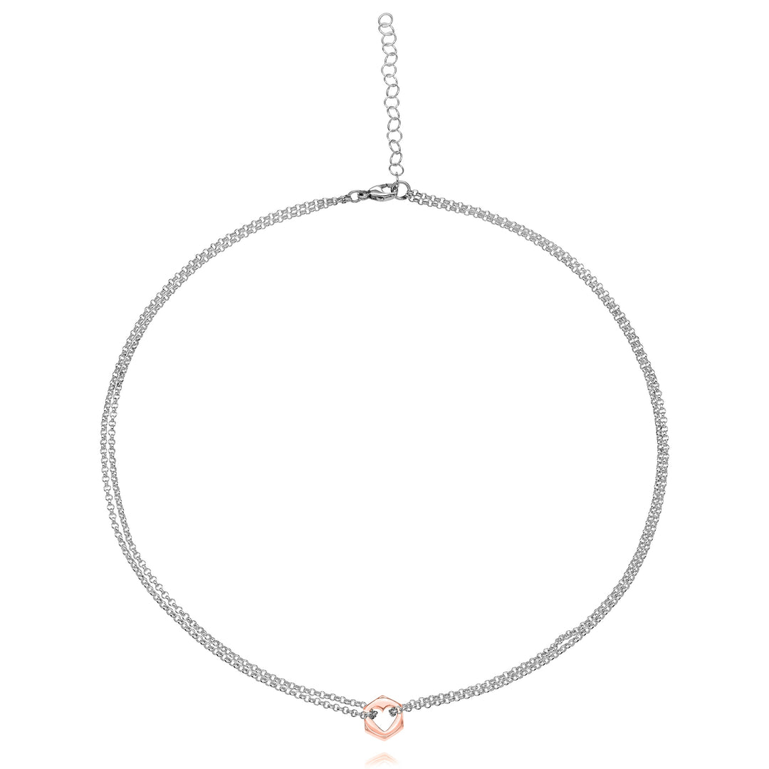 Rose gold hex nut pendant necklace with a heart-shaped cut out in center with silver chain looped through either side, on a white background