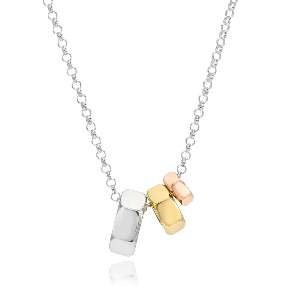 Silver chain necklace with three colored pendants in silver, yellow gold, and rose gold on a white background