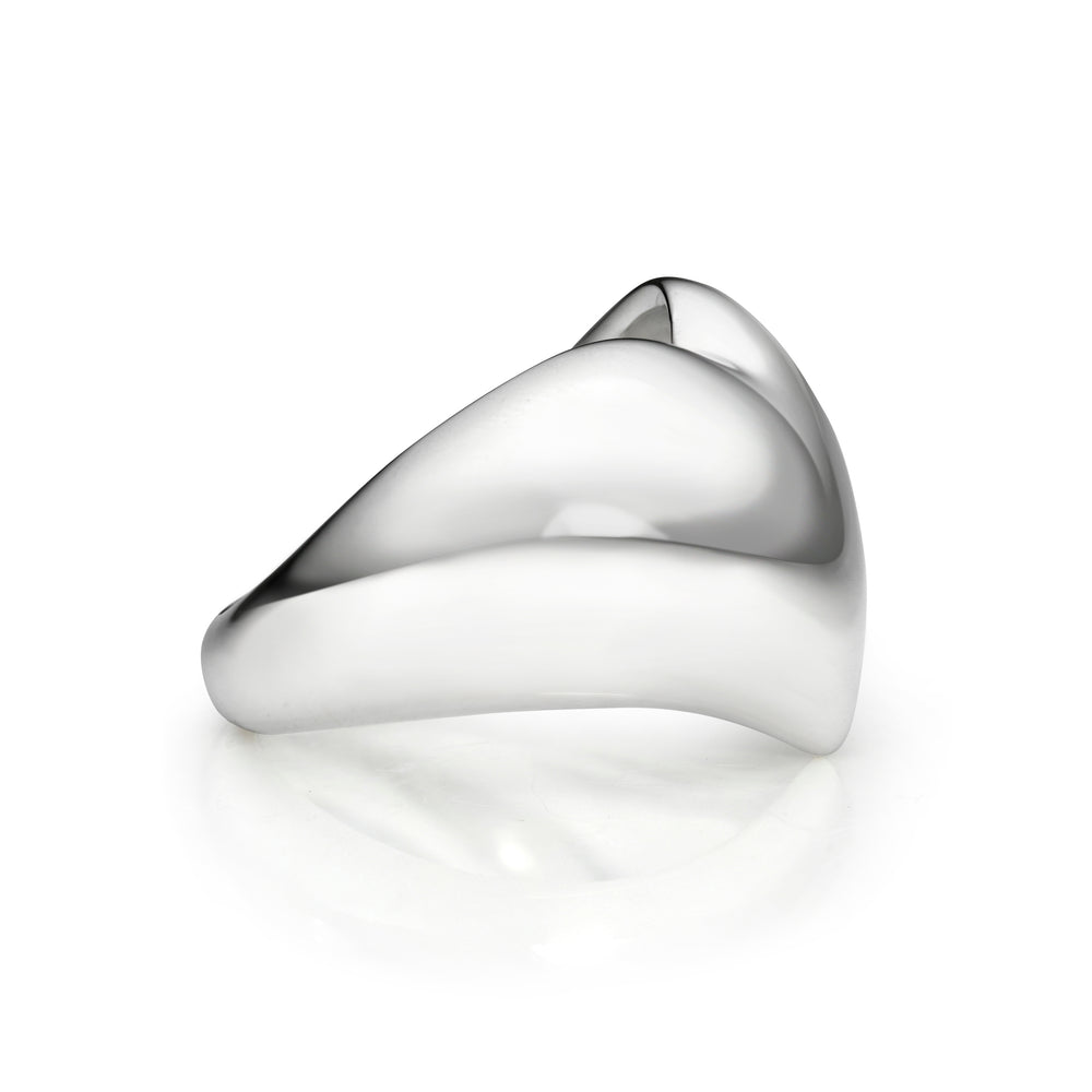 Side view of silver heart ring on a white background