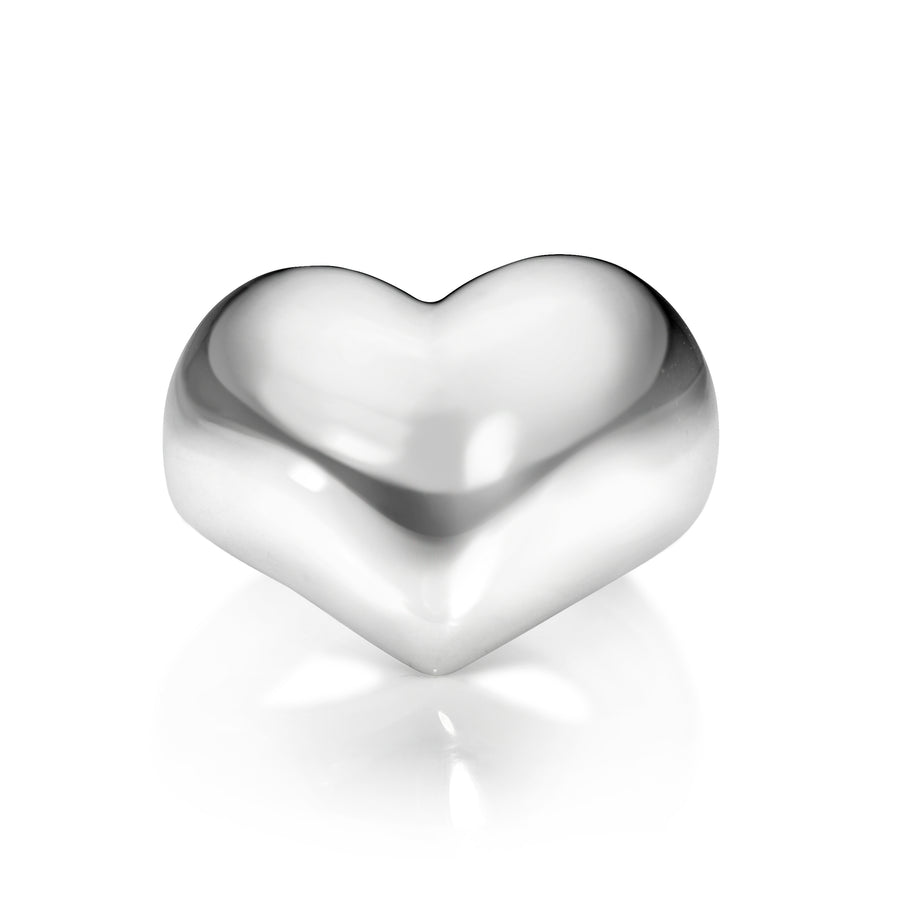 Silver heart ring against a white background
