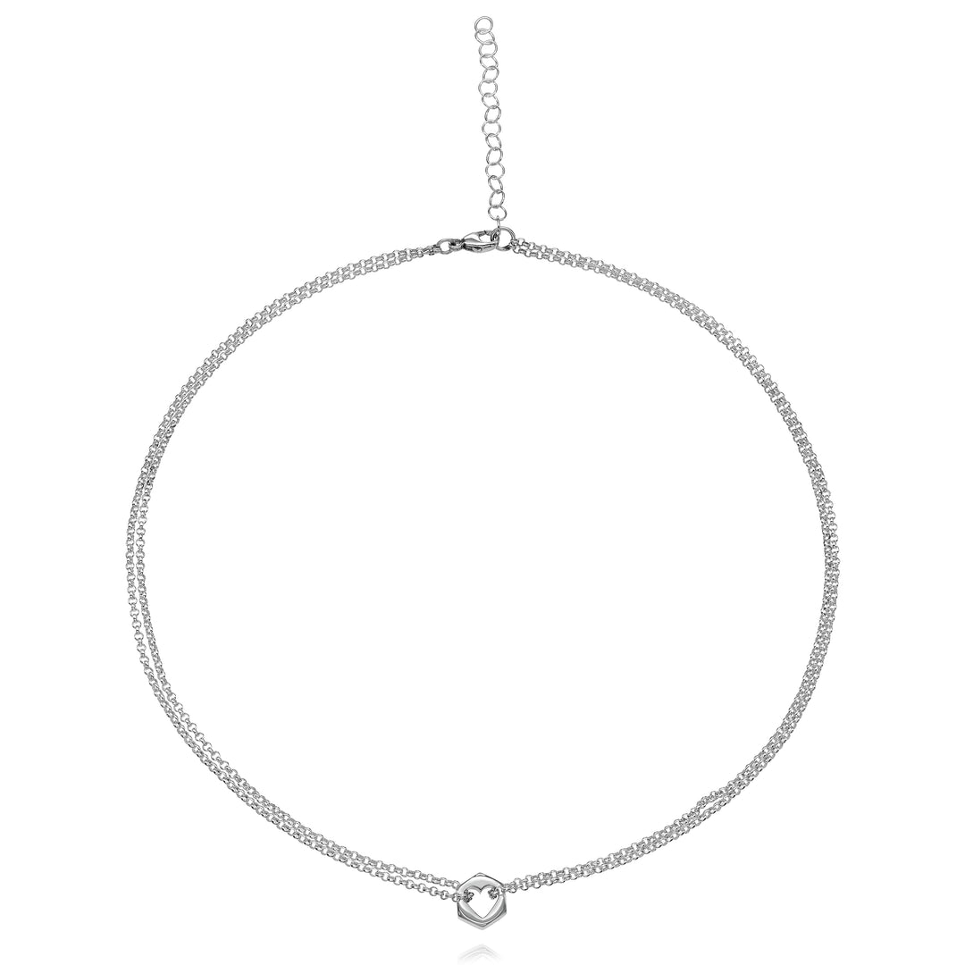 Silver hex nut pendant necklace with a heart-shaped cut out in center with silver chain looped through either side, on a white background