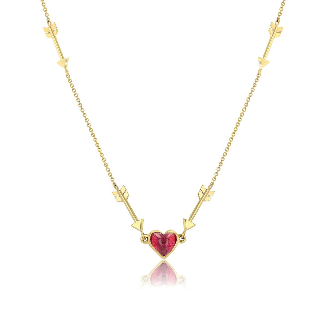 Pink stone heart pendant with two yellow gold arrows on either side and chain in-between