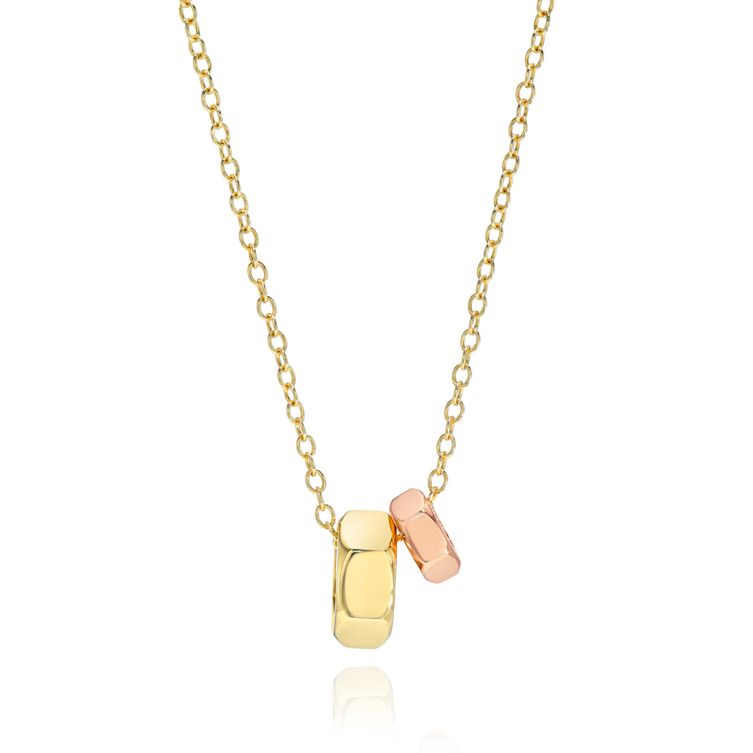 Gold and rose gold hex nut pendant necklace with on a white background
