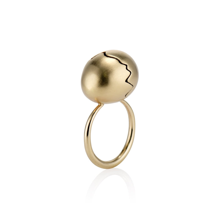 Yellow gold broken egg on top of round ring band
