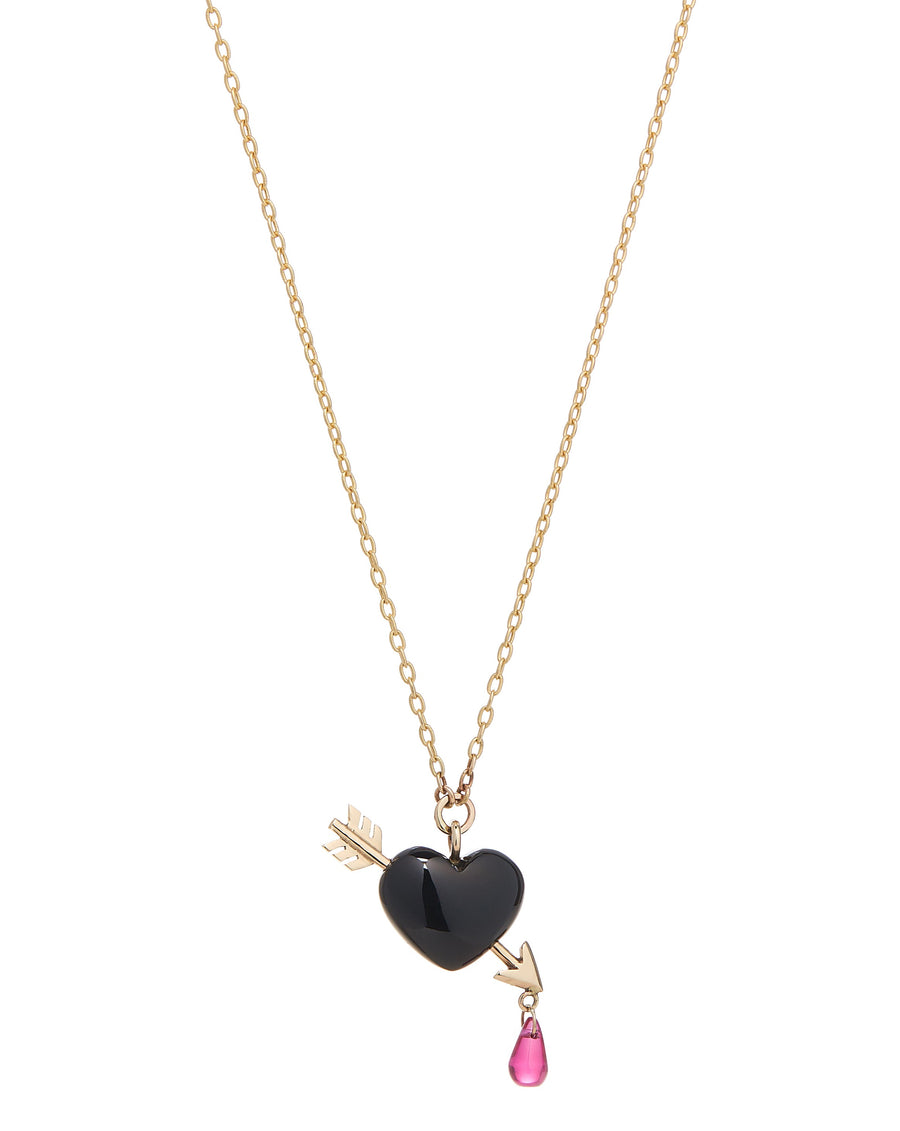 small Smooth jet black onyx heart is pierced with a golden arrow, dripping a single droplet of ruby blood on gold chain necklace