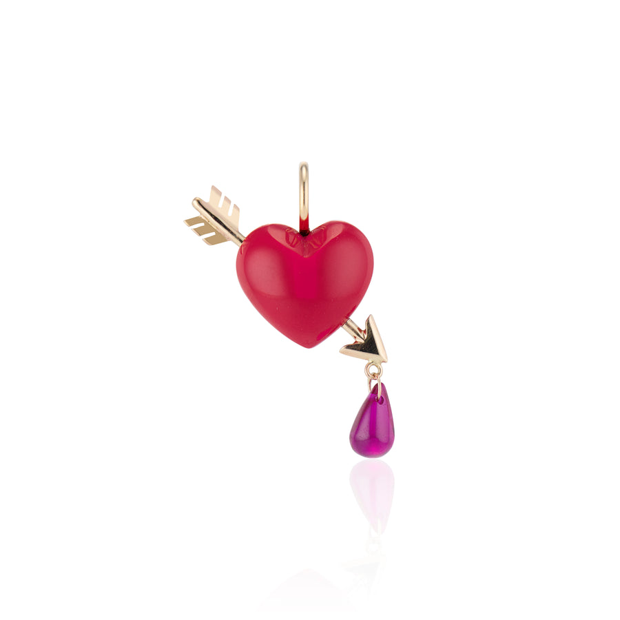 coral heart with gold arrow pierced through it at an angle with one red rby droplet hanging off point of arrow with gold bail