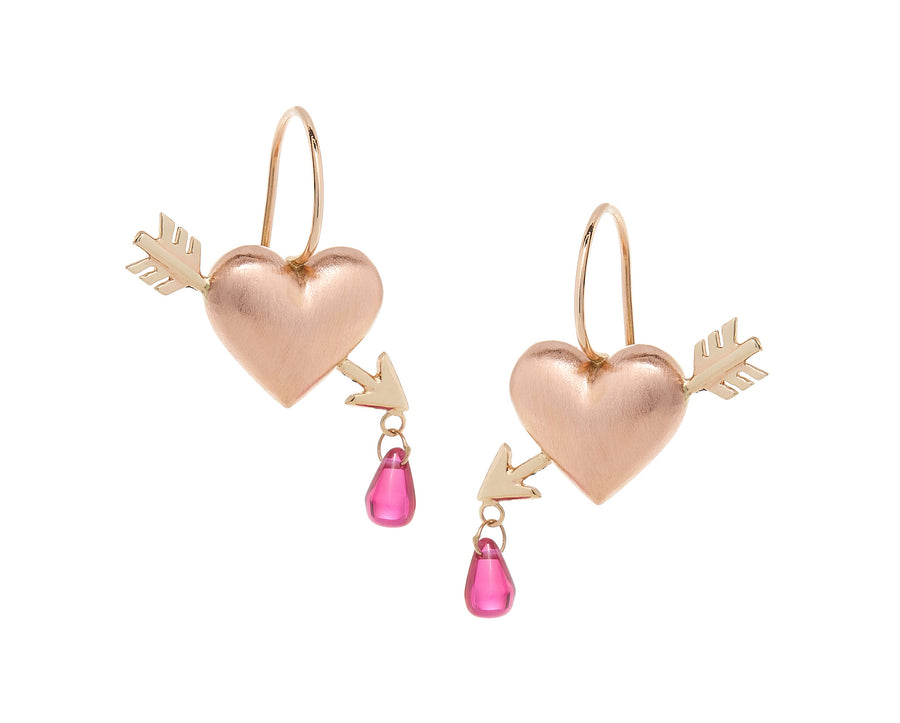 puff heart hook earrings in rose gold with yellow gold arrows piercing heart with lab grown rubies dripping from tip of arrow