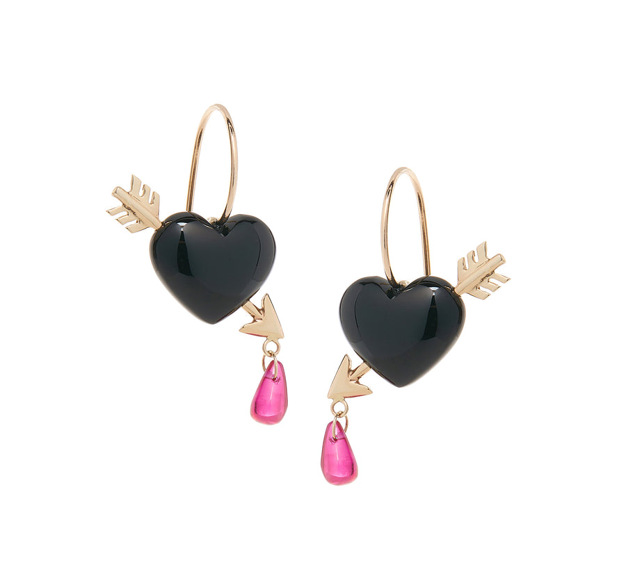 petite smooth jet black onyx heart earrings are pierced with 14K gold arrows, leaving a single drop of ruby blood dripping from its tip with gold ear wire