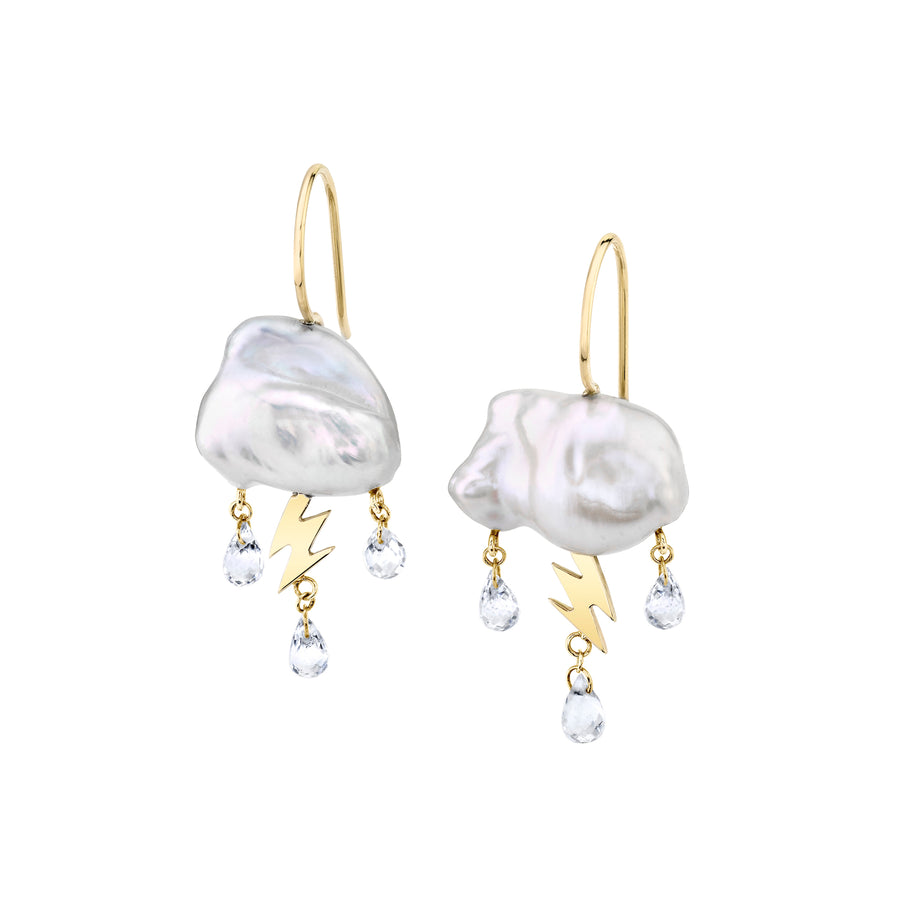 White keshi pearl clouds are electrified with 14K yellow gold lightning bolts as a trio of white topaz rain down