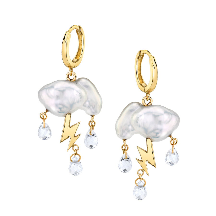 white stormy keshi cloud like pearl earrings with 14K yellow gold lightning bolts as a trio of white topaz rain down with gold huggie hoops