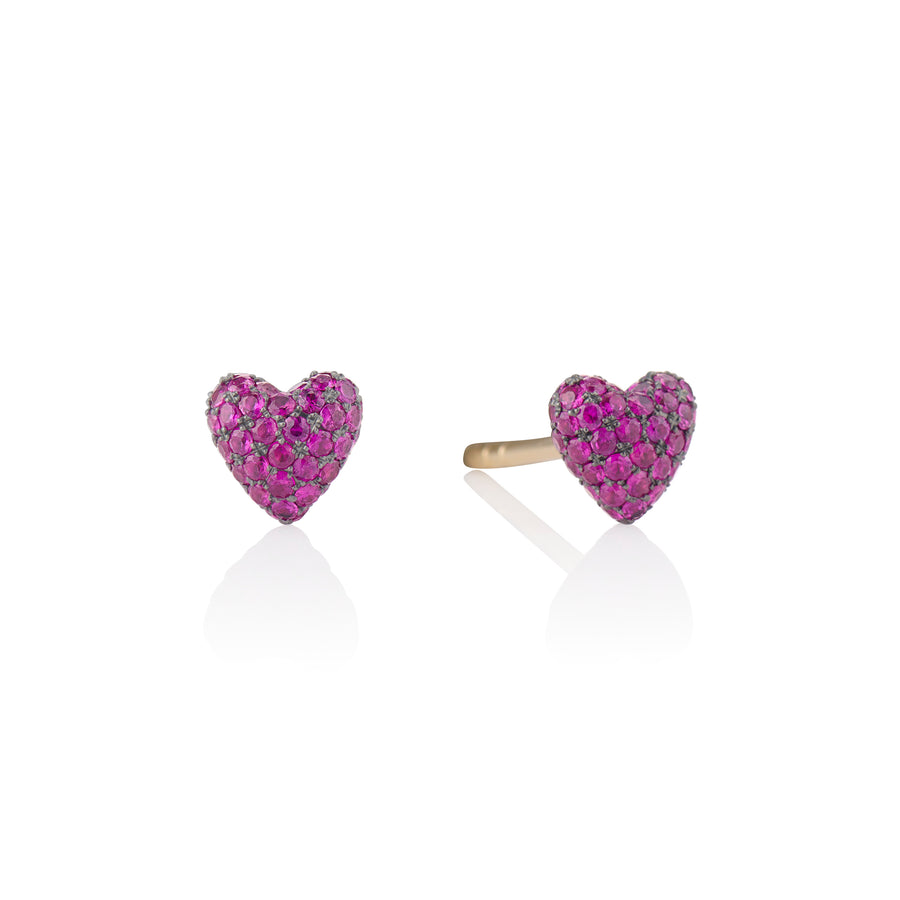 ruby heart studs on a white background