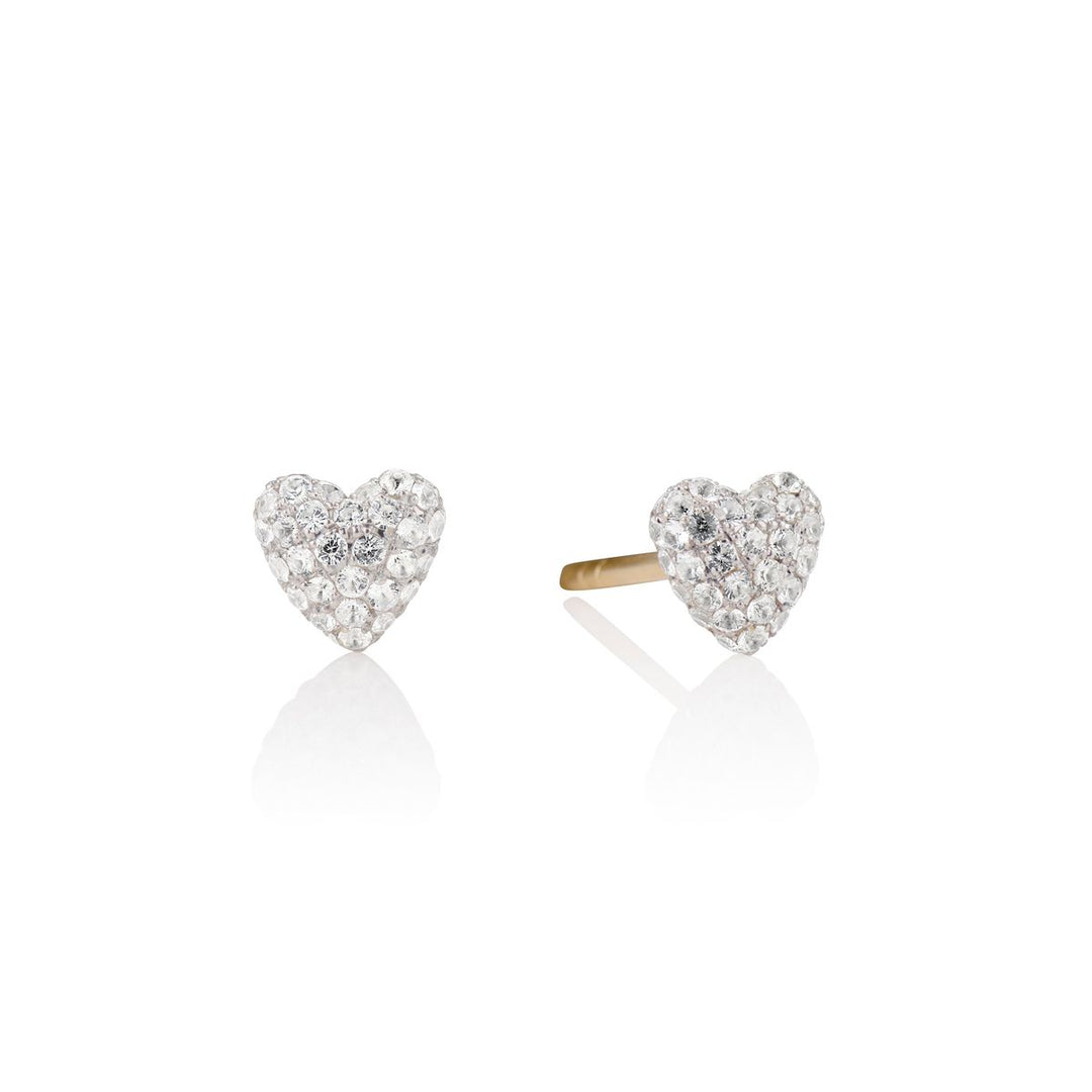 white sapphire heart studs on a white background